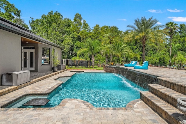26221 Pheasant Run, Wesley Chapel, FL 33544 - view of swimming pool featuring french doors and a patio
