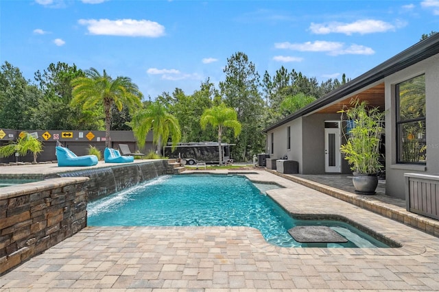 26221 Pheasant Run, Wesley Chapel, FL 33544 - view of pool with a patio and view of wooded area