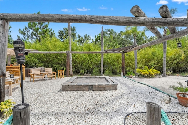 26221 Pheasant Run, Wesley Chapel, FL 33544 - view of patio featuring an outdoor fire pit