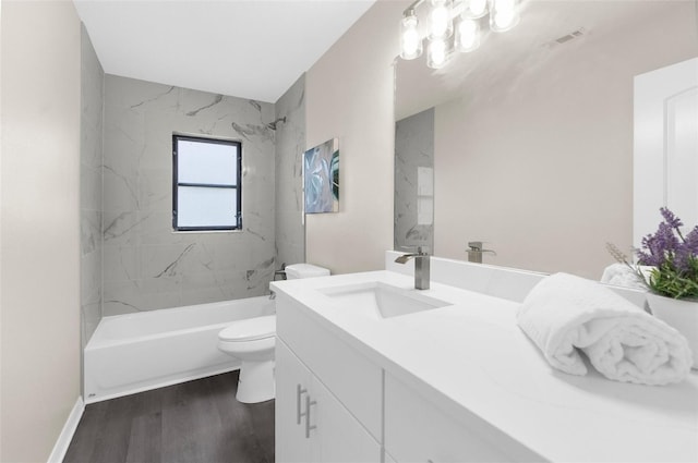5215 Azalea Cir, Dade City, FL 33523 - full bathroom with vanity, tub / shower combination, and wood finished floors