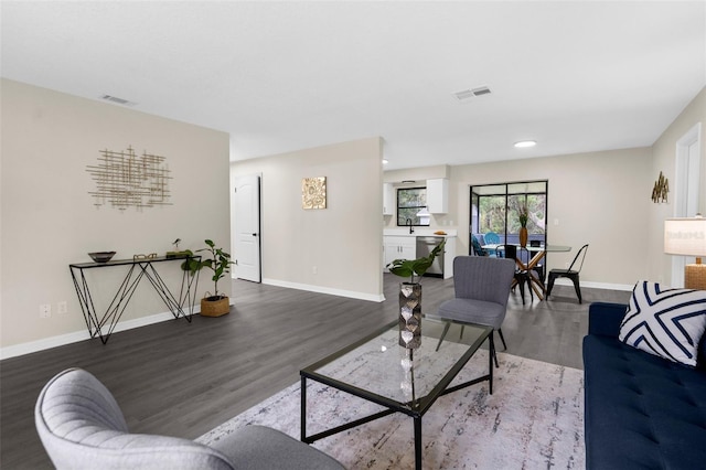5215 Azalea Cir, Dade City, FL 33523 - living area with wood finished floors and baseboards