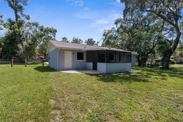 5215 Azalea Cir, Dade City, FL 33523 - rear view of property with a sunroom and a patio