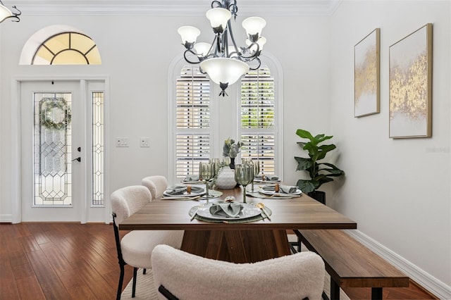 9829 Sorbonne Loop, Seffner, FL 33584 - dining room with a chandelier, crown molding, and wood finished floors