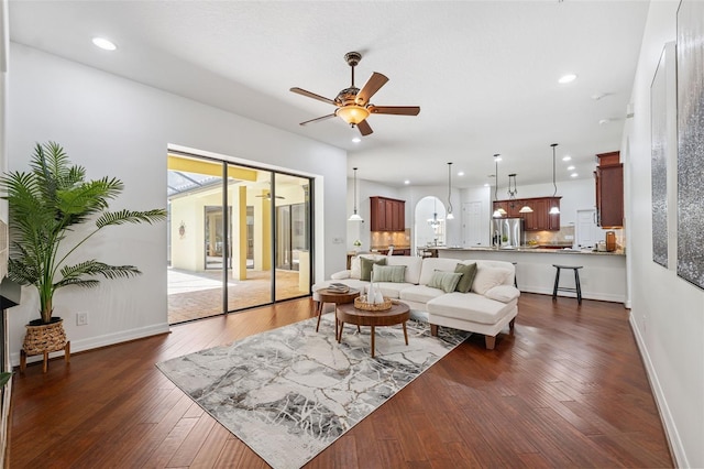 9829 Sorbonne Loop, Seffner, FL 33584 - living area featuring recessed lighting, a ceiling fan, and dark wood-type flooring