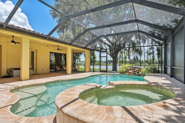9829 Sorbonne Loop, Seffner, FL 33584 - view of swimming pool featuring ceiling fan, a pool with connected hot tub, a patio area, and a lanai