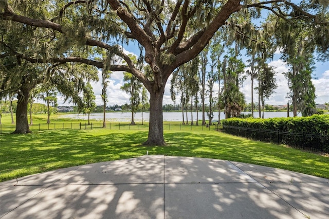 9829 Sorbonne Loop, Seffner, FL 33584 - view of home's community featuring a water view and a patio