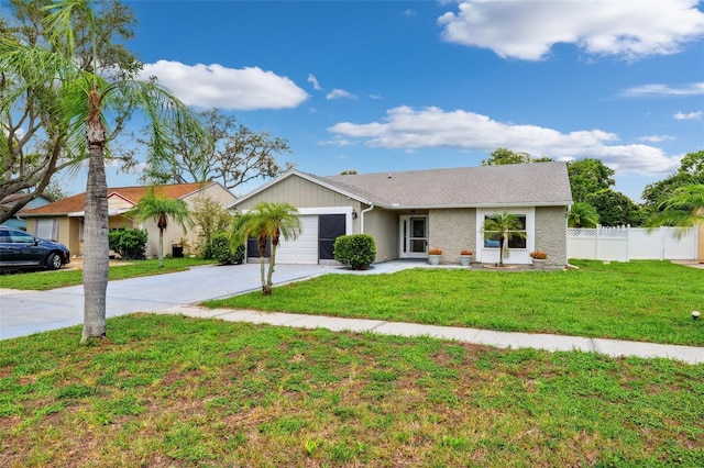 3204 Payne St, New Port Richey, FL 34655 - ranch-style house with concrete driveway and a garage
