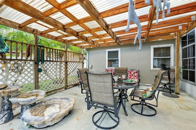 3204 Payne St, New Port Richey, FL 34655 - view of patio / terrace with outdoor dining area and a pergola