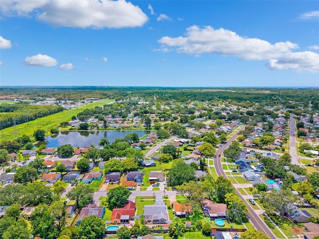 3204 Payne St, New Port Richey, FL 34655 - aerial perspective of suburban area with a large body of water