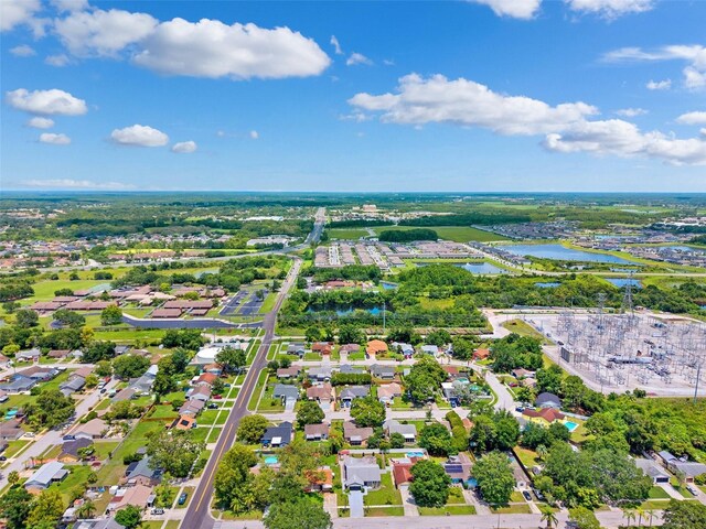 3204 Payne St, New Port Richey, FL 34655 - aerial overview of property's location featuring a large body of water and nearby suburban area