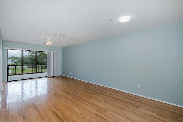 5640 Ferguson Ct Unit 2203, New Port Richey, FL 34652 - empty room with a ceiling fan and light wood-style floors