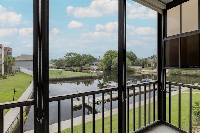 5640 Ferguson Ct Unit 2203, New Port Richey, FL 34652 - unfurnished sunroom with a water view