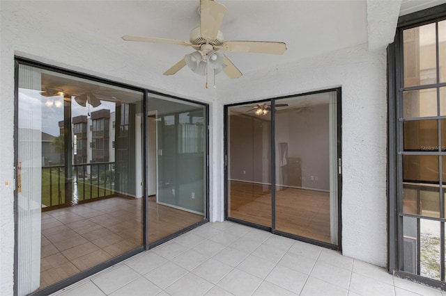 5640 Ferguson Ct Unit 2203, New Port Richey, FL 34652 - unfurnished sunroom featuring a ceiling fan