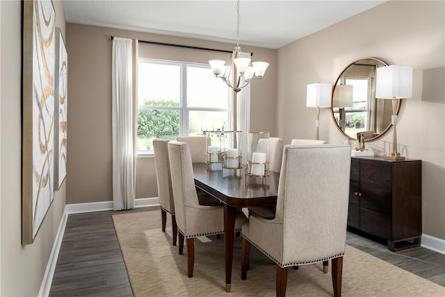3878 Isle Royal Pl, Apopka, FL 32712 - dining area with a chandelier and wood finished floors