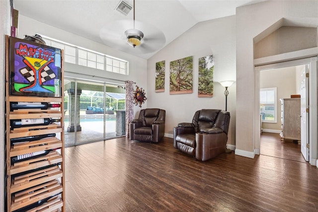 1478 Brigadier Dr, Spring Hill, FL 34608 - living area with ceiling fan, wood finished floors, healthy amount of natural light, and high vaulted ceiling
