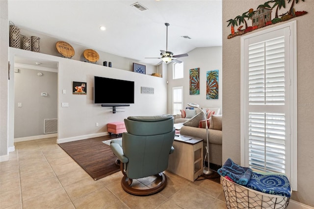 1478 Brigadier Dr, Spring Hill, FL 34608 - living room with light tile patterned floors, ceiling fan, and vaulted ceiling