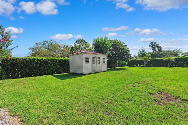 1478 Brigadier Dr, Spring Hill, FL 34608 - view of yard featuring a storage shed