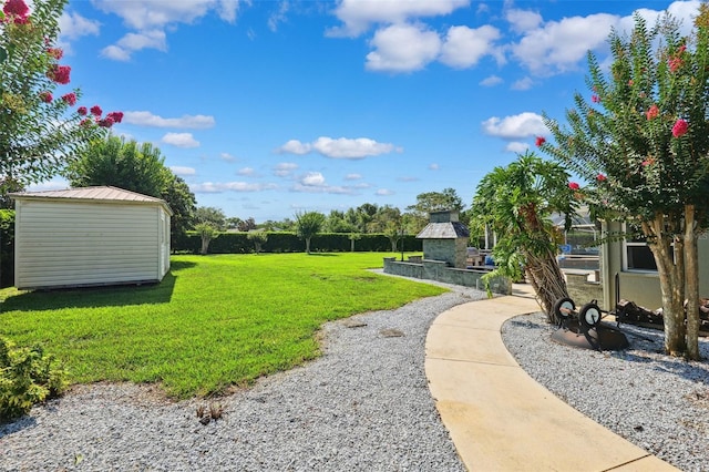 1478 Brigadier Dr, Spring Hill, FL 34608 - view of green lawn with an outdoor stone fireplace and an outbuilding