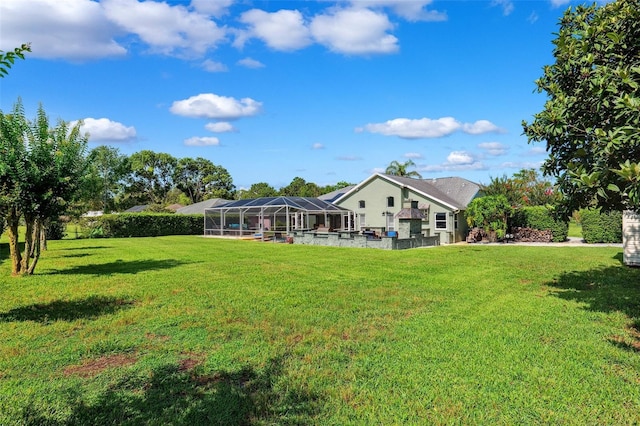 1478 Brigadier Dr, Spring Hill, FL 34608 - rear view of house featuring a lawn and glass enclosure