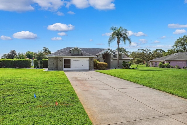 1478 Brigadier Dr, Spring Hill, FL 34608 - view of front facade featuring concrete driveway, a front lawn, an attached garage, and brick siding