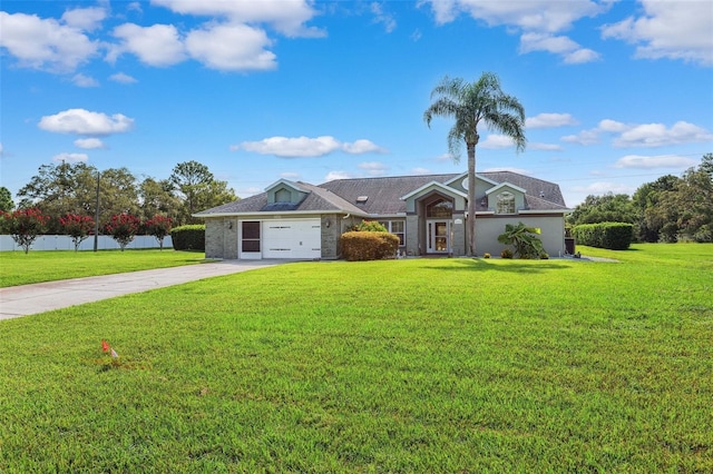 1478 Brigadier Dr, Spring Hill, FL 34608 - view of front facade with driveway, an attached garage, and a front yard
