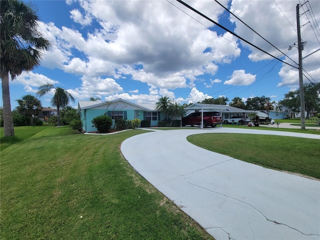 6737 Clark St, Hudson, FL 34667 - single story home with curved driveway and a front yard