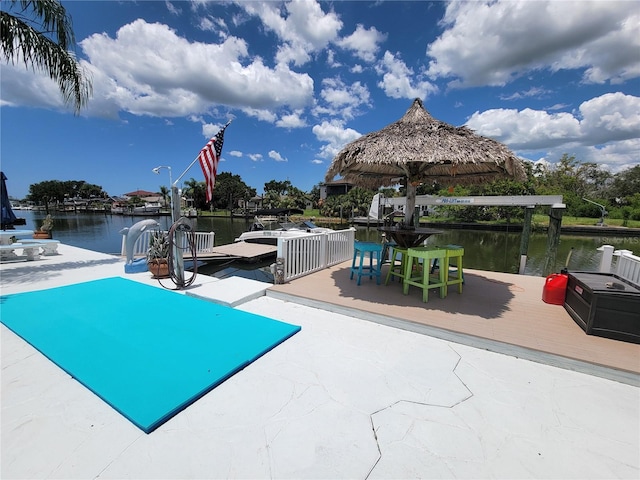 6737 Clark St, Hudson, FL 34667 - view of swimming pool featuring a water view
