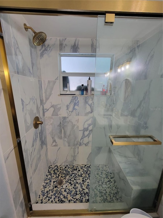 6737 Clark St, Hudson, FL 34667 - bathroom featuring a shower stall