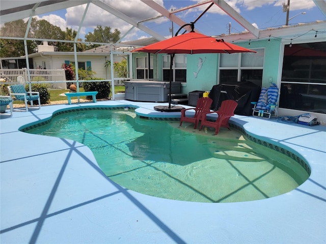 6737 Clark St, Hudson, FL 34667 - swimming pool with a hot tub, a patio, a grill, and a lanai