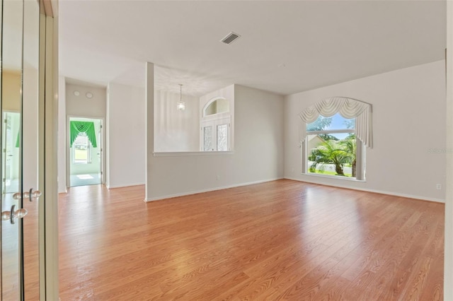 7328 Blue Skies Dr, Spring Hill, FL 34606 - empty room with light wood-type flooring and baseboards