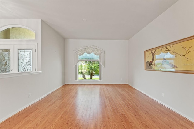 7328 Blue Skies Dr, Spring Hill, FL 34606 - spare room with wood finished floors and baseboards