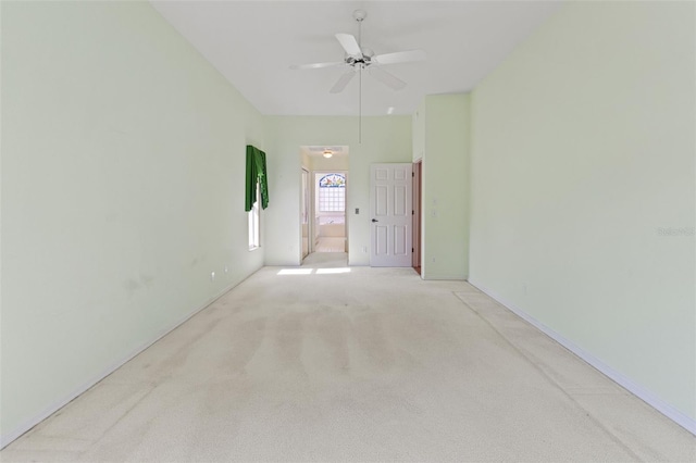 7328 Blue Skies Dr, Spring Hill, FL 34606 - empty room featuring light colored carpet and a ceiling fan