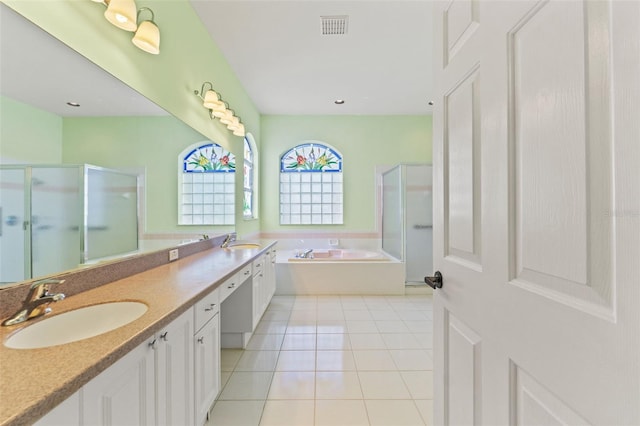 7328 Blue Skies Dr, Spring Hill, FL 34606 - full bath with a shower stall, a bath, tile patterned flooring, and double vanity