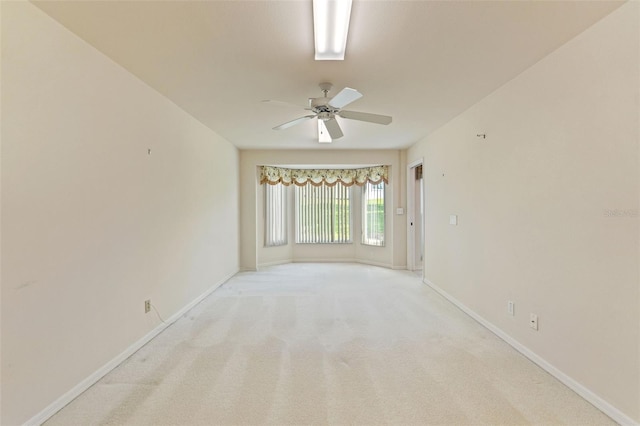 7328 Blue Skies Dr, Spring Hill, FL 34606 - empty room featuring ceiling fan and light colored carpet