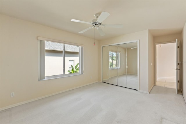 7328 Blue Skies Dr, Spring Hill, FL 34606 - unfurnished bedroom with carpet floors, a closet, and a ceiling fan
