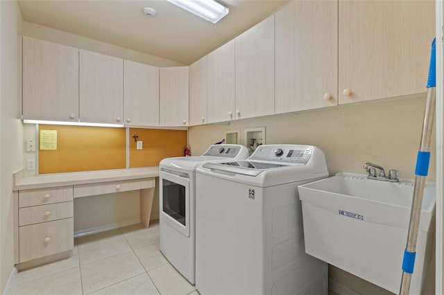 7328 Blue Skies Dr, Spring Hill, FL 34606 - laundry area with cabinet space, separate washer and dryer, light tile patterned flooring, and an office area
