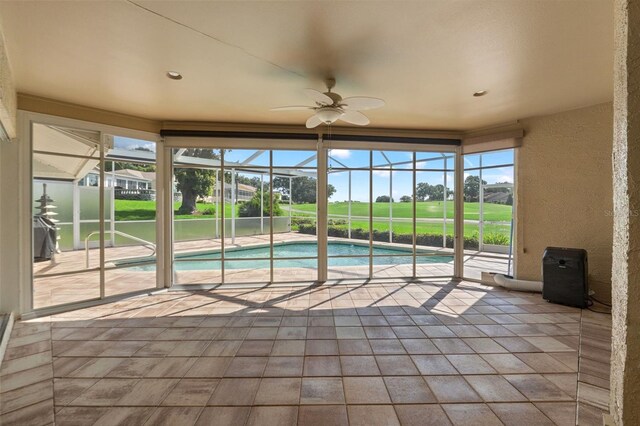 7328 Blue Skies Dr, Spring Hill, FL 34606 - outdoor pool featuring a ceiling fan, a patio area, and a lanai