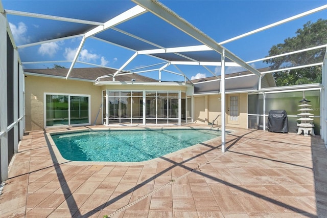 7328 Blue Skies Dr, Spring Hill, FL 34606 - outdoor pool featuring a patio area and glass enclosure
