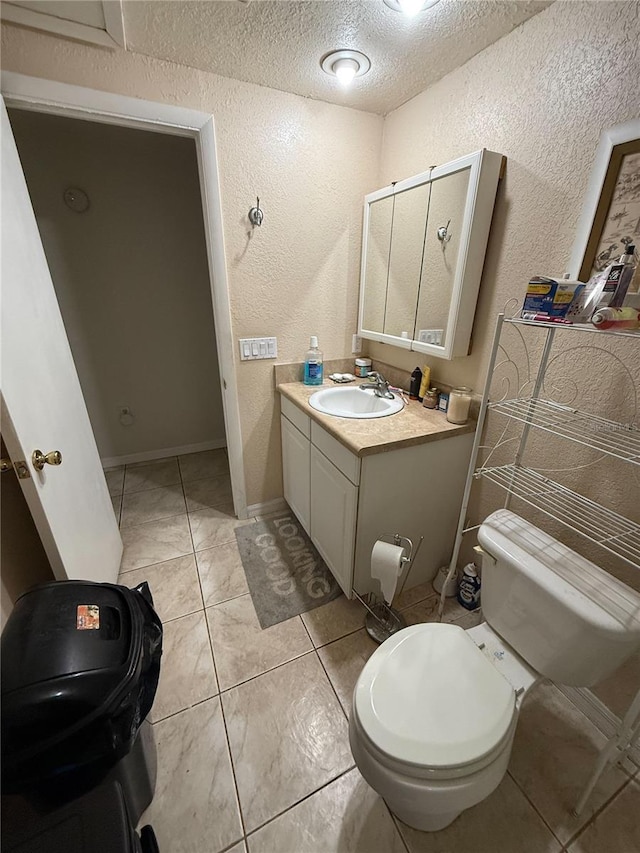 5635 Kimball Rd, Mulberry, FL 33860 - bathroom with a textured wall, vanity, and a textured ceiling