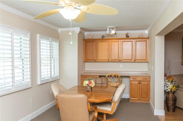 4452 Garnet Dr Unit 302, New Port Richey, FL 34652 - dining room with a ceiling fan, ornamental molding, a textured ceiling, and light colored carpet