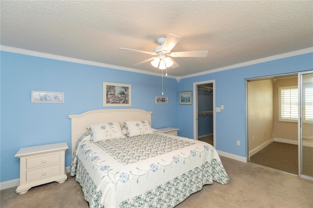 4452 Garnet Dr Unit 302, New Port Richey, FL 34652 - bedroom with carpet, a textured ceiling, crown molding, and a ceiling fan