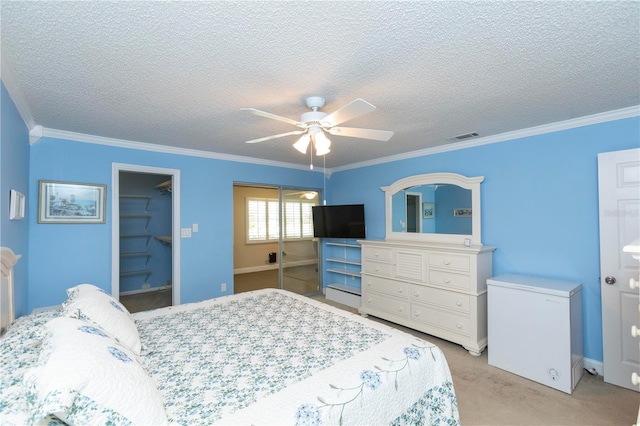 4452 Garnet Dr Unit 302, New Port Richey, FL 34652 - bedroom with fridge, light colored carpet, a textured ceiling, crown molding, and a closet