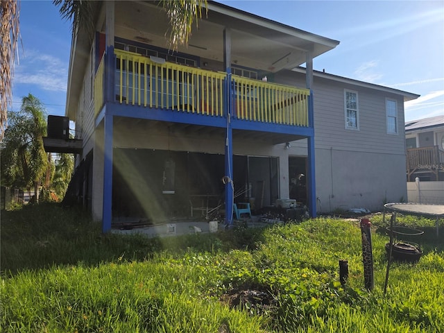 5420 Bay Blvd, Port Richey, FL 34668 - back of house featuring a balcony