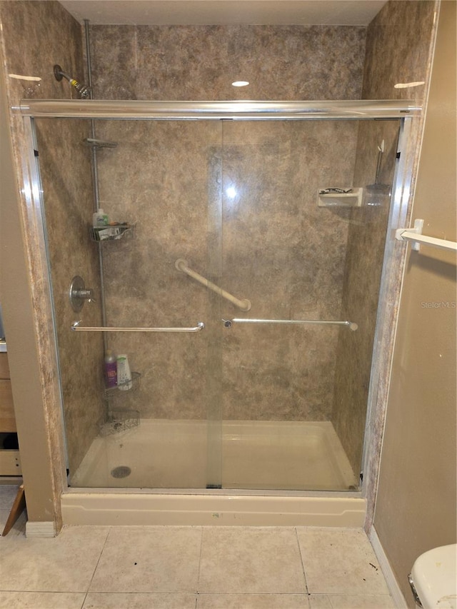 5420 Bay Blvd, Port Richey, FL 34668 - bathroom featuring tile patterned flooring and a stall shower