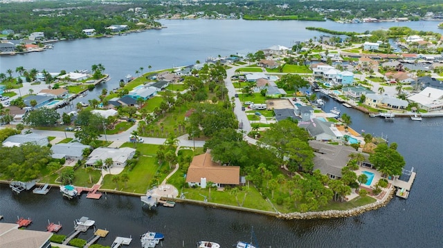8143 Channel Dr, Port Richey, FL 34668 - aerial overview of property's location featuring nearby suburban area and a nearby body of water