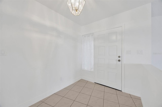 8143 Channel Dr, Port Richey, FL 34668 - foyer entrance with light tile patterned floors