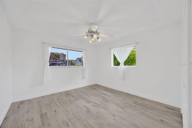 8143 Channel Dr, Port Richey, FL 34668 - spare room with wood finished floors and ceiling fan