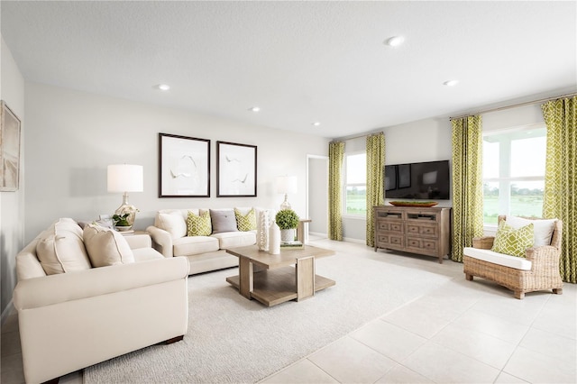 10864 SW 73rd Ct, Ocala, FL 34476 - living room featuring light tile patterned floors and recessed lighting