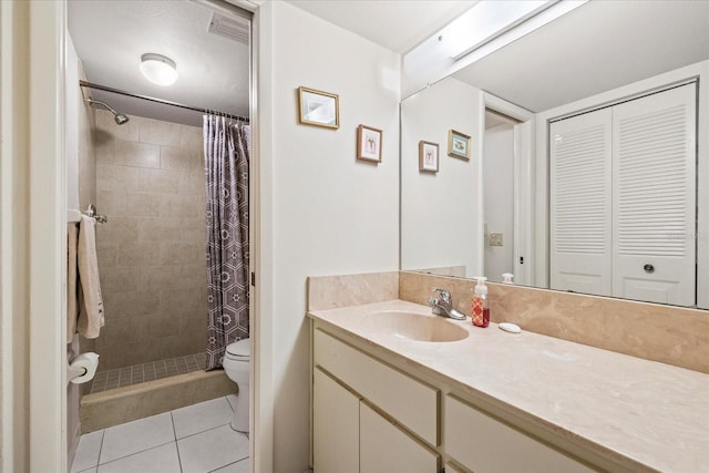 12141 Spartan Way Unit 102, Hudson, FL 34667 - full bath with vanity, tile patterned floors, a tile shower, and a closet