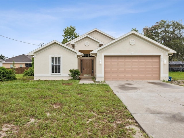 5048 Teather St, Spring Hill, FL 34608 - view of front of property featuring an attached garage, driveway, stucco siding, and a front lawn